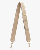 Adjustable strap with buckle and clip attachments at ends.