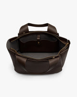 Open tote bag with handles and visible pocket inside