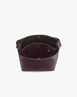Open tote bag with a wide handle and spacious interior.