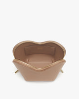 Open purse with visible interior and zipper