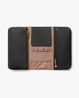 Leather wallet with multiple compartments and zippers on white background.