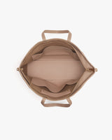 Open bag viewed from above, showing its empty interior.
