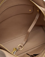 Open bag interior with keyring and keys attached