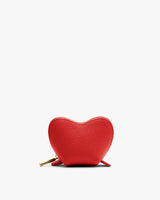 Heart-shaped pouch with a zipper pull.