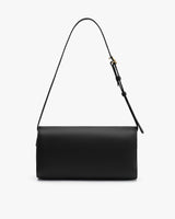 Rectangular handbag with a long shoulder strap displayed upright
