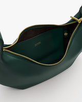 Open handbag with visible interior and zip closure.