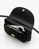 Open handbag showing interior pocket with a phone and a zipped compartment.