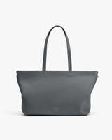 Tote bag with long handles and simple design.