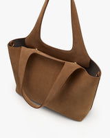 Tote bag with long handles and open top design.