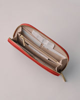 Open wallet with multiple compartments and a zipper closure.