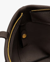 Open bag with visible zipper and pocket inside