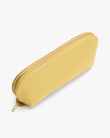 Rectangular zippered pouch with curved edge viewed from above.