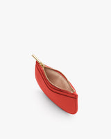 Small open pouch with zipper and leather texture.