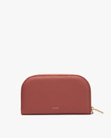 Rectangular leather wallet with a zip closure and small brand name.