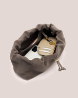 Open travel bag with phone and wallet inside.