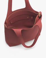 Open tote bag with handle and zipper pocket inside.