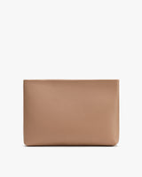 Rectangular leather clutch bag stands upright against a plain background.
