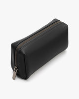 Rectangular zippered pouch with textured surface.