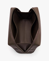 Open travel bag showing interior with two side pockets and a spacious main compartment.