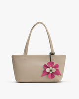 Handbag with floral decoration and two handles