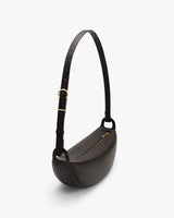 Shoulder bag with a long adjustable strap and a zipper on the top.