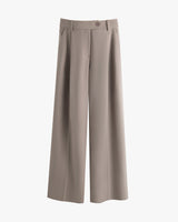 Wide-leg trousers with button and belt loops.