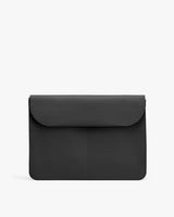 Simple crossbody bag with a flap closure.