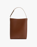 A handbag with a single strap and rectangular shape.
