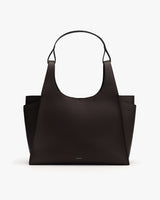 Large tote bag with a sleek design and shoulder straps.
