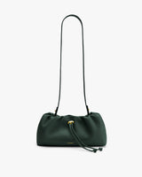 Handbag with long strap and drawstring closure.