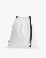 Drawstring bag with a strap on a plain background.