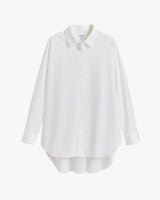 Long sleeve blouse on plain background