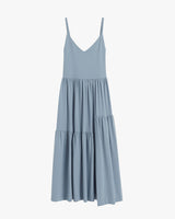 Sleeveless dress with tiered skirt.
