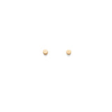 Two round objects placed apart on a plain surface.