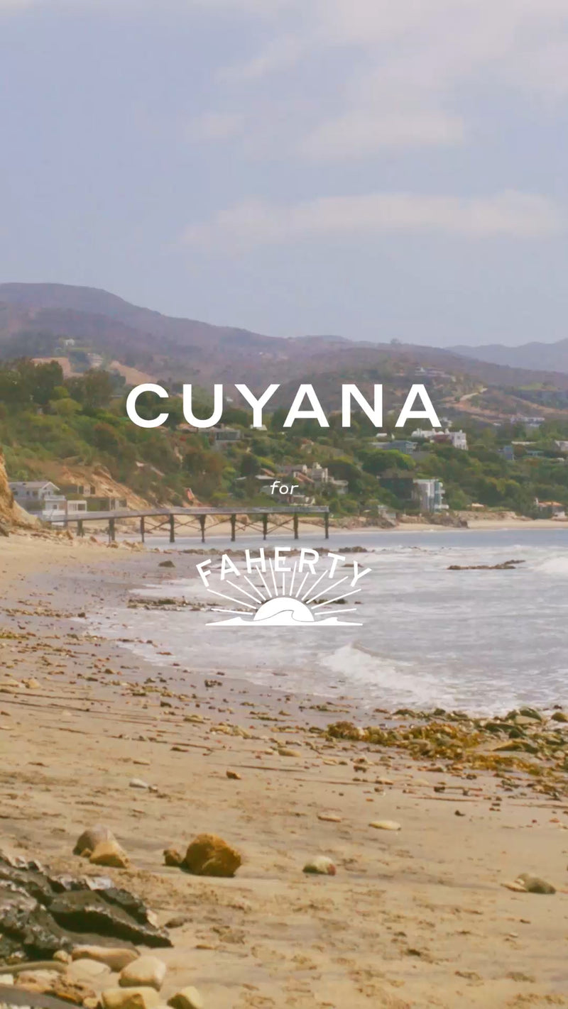Beach view with Cuyana for Faherty text.