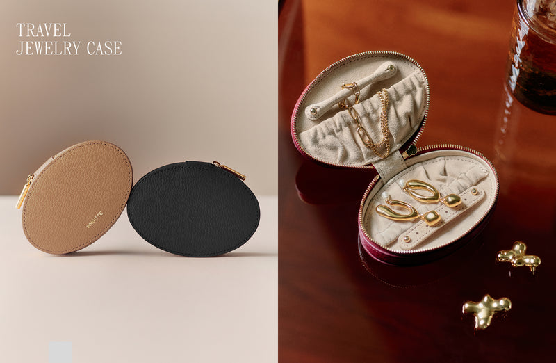 Two travel jewelry cases, one open with jewelry displayed inside.