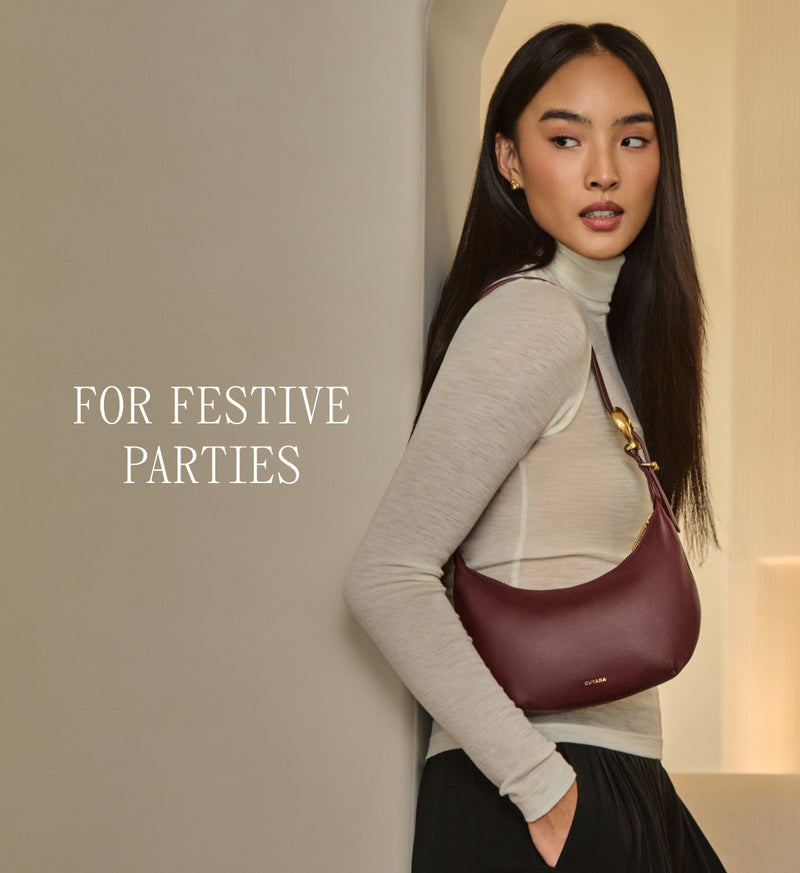 Person leaning against wall with small shoulder bag, text reads for festive parties