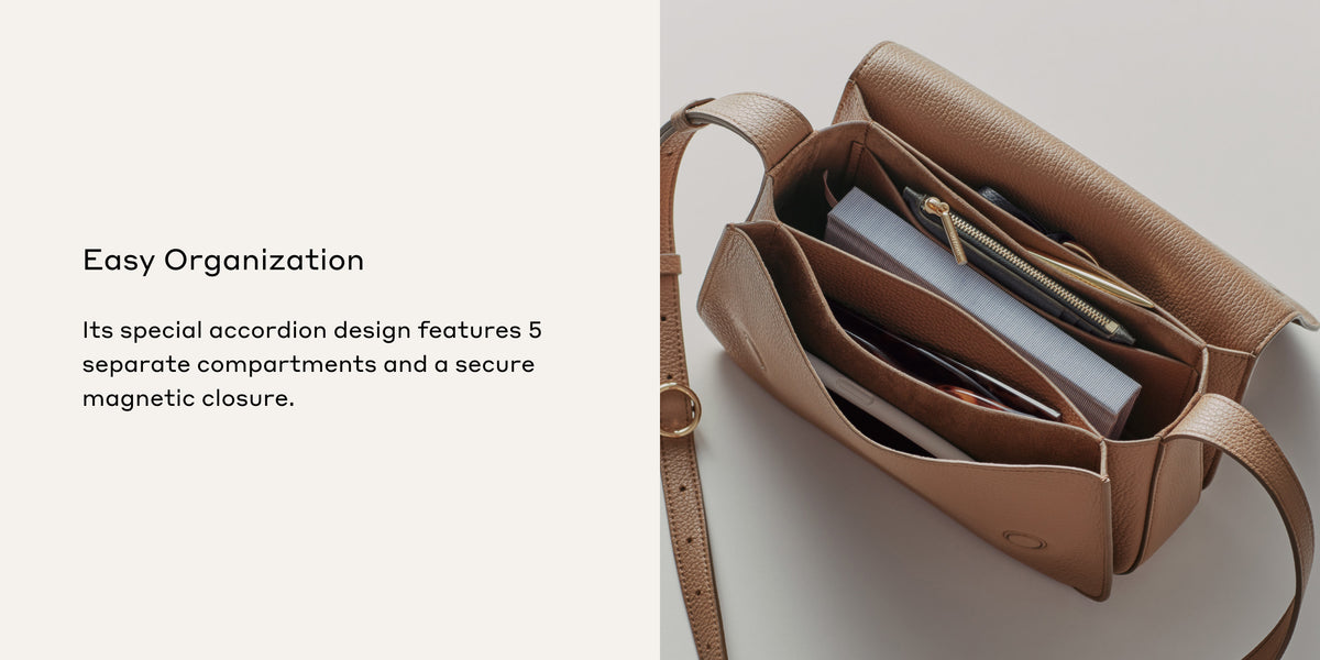 Open handbag showing internal compartments with items inside.