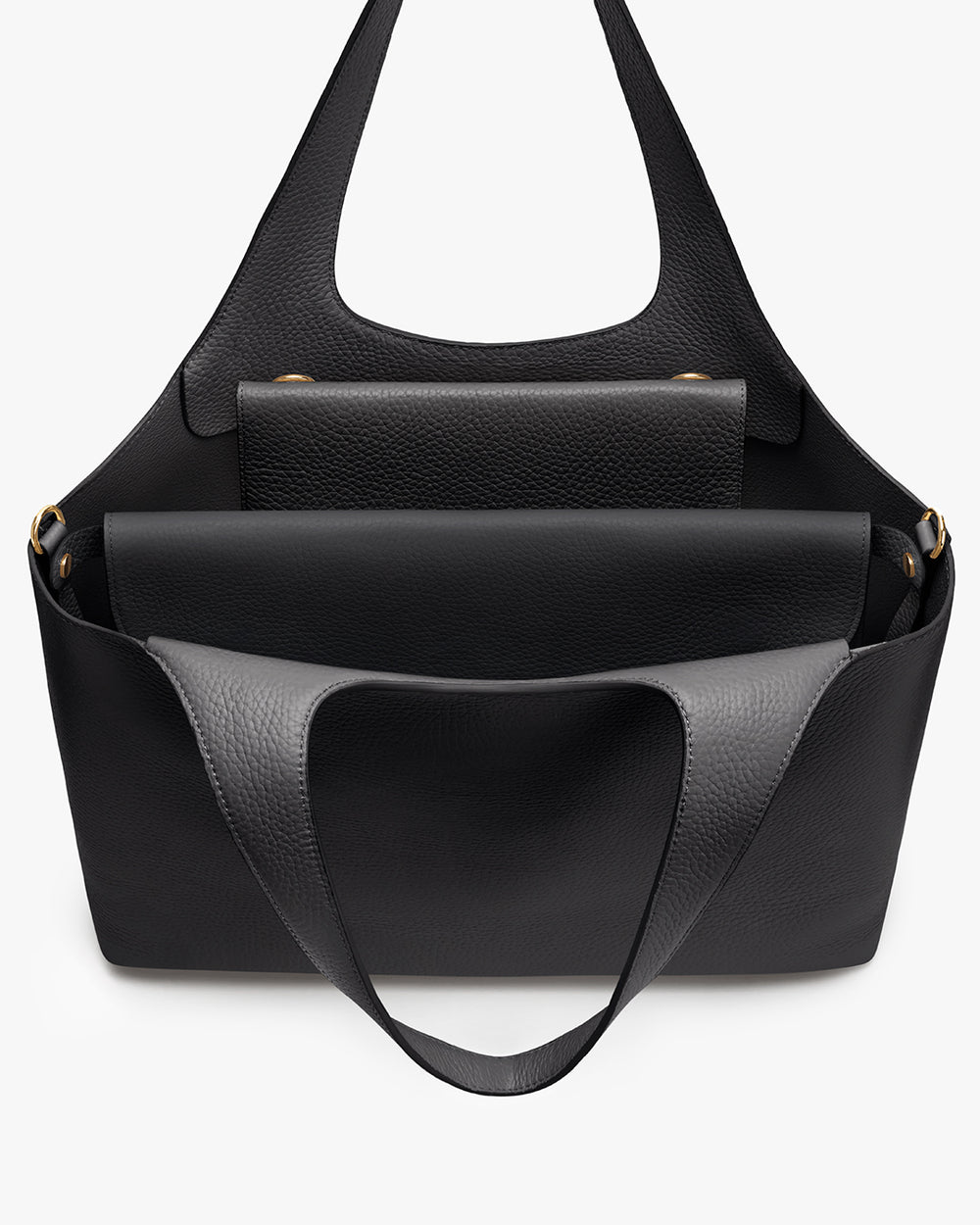 Large handbag with a flap cover and adjustable strap.