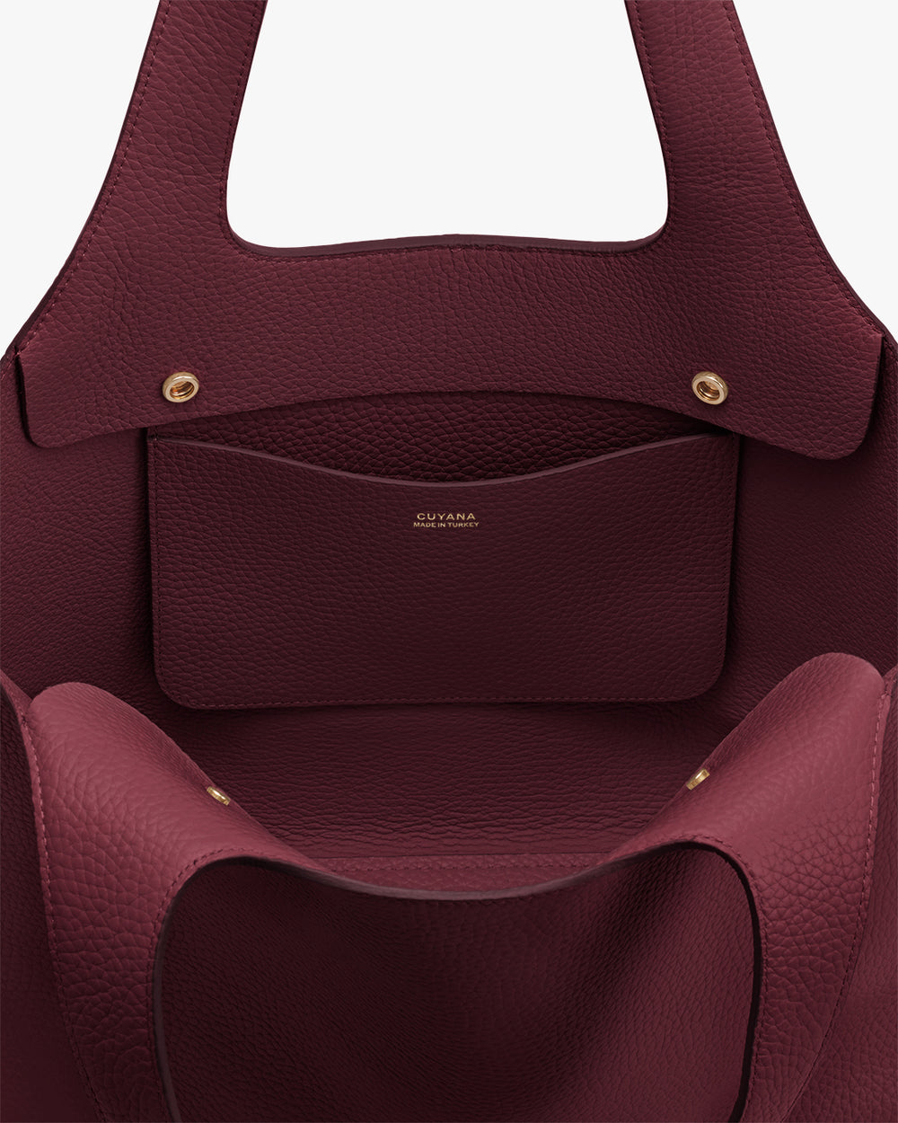 Open tote bag with an inner pocket and gold button snaps