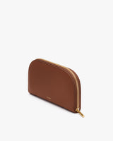 Half-circle leather zippered pouch.
