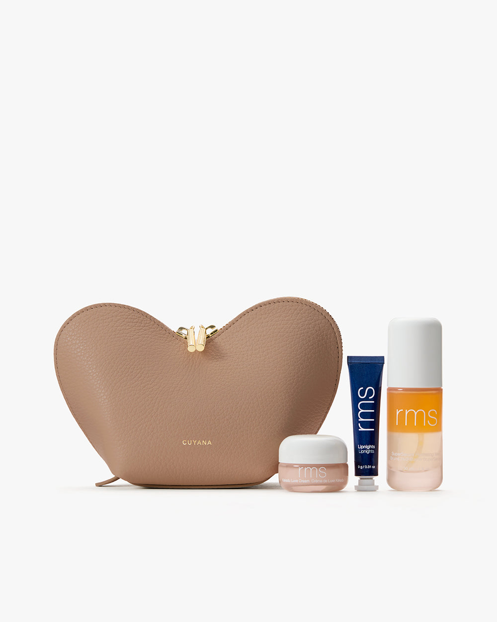 Heart-shaped bag with skincare products displayed in front.