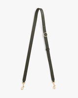 Adjustable strap with buckle and metal clasps at each end.