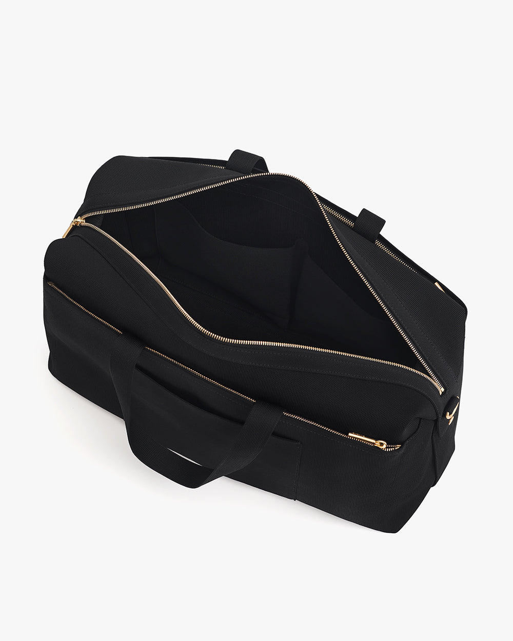 Open travel bag with visible zippers and handles.