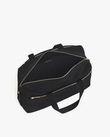 Open travel bag with shoulder strap and zippered compartments