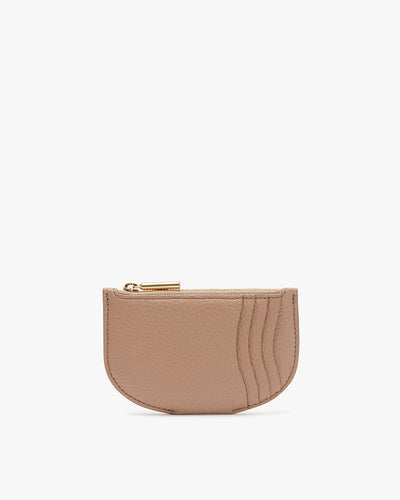 Small coin purse with a textured design and zip closure