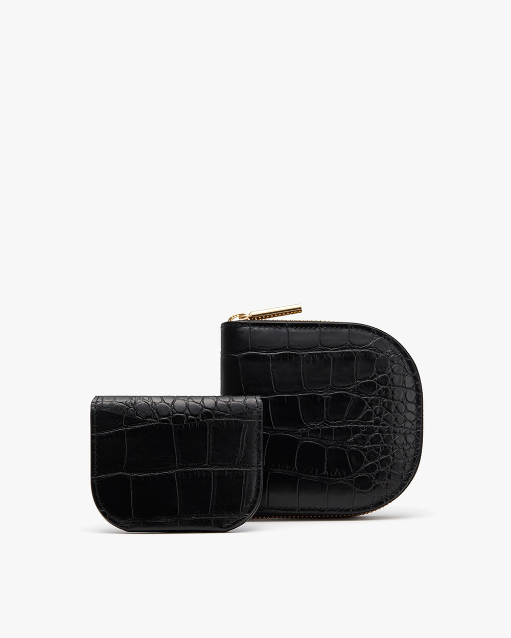 Two small pouches with zipper closures displayed together.
