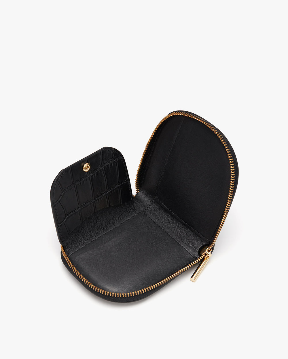Open small wallet with a zipper on a plain background