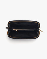 Open rectangular zippered pouch with an interior zipper compartment.
