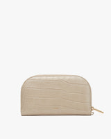 Zippered cosmetic bag with a textured pattern.